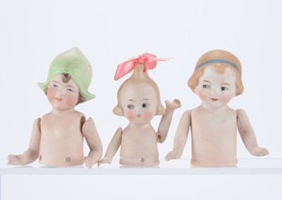 Lot 1304 - Three German bisque half dolls with jointed arms