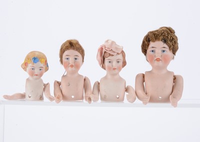 Lot 1305 - Four German bisque half dolls with jointed arms