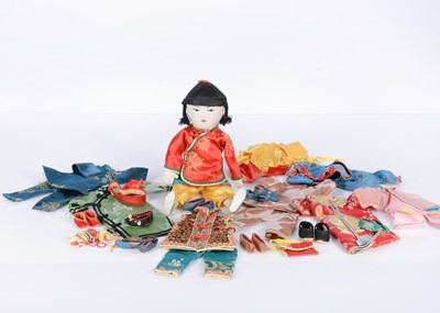Lot 1331 - An Ada Lum cloth doll with unusual additional clothing