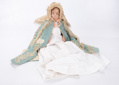 Lot 1335 - ‘Belinda’, a mid 19th century English poured wax child doll with provenance