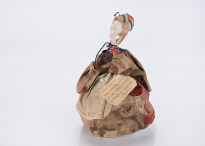 Lot 1339 - A late 19th century pipe sewing doll