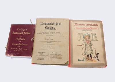 Lot 1344 - Three late 19th century German doll dress pattern books