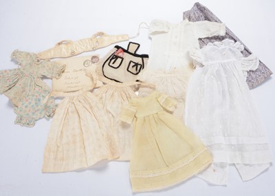 Lot 1347 - A mixed 1900 - 1950s medium size doll's clothes