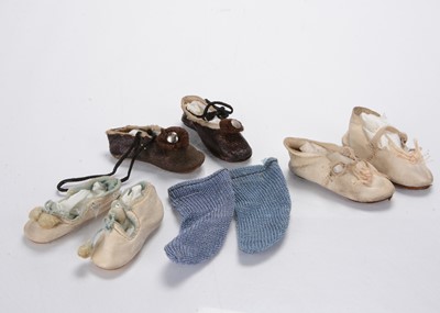 Lot 1349 - Three pairs of antique doll’s leather shoes
