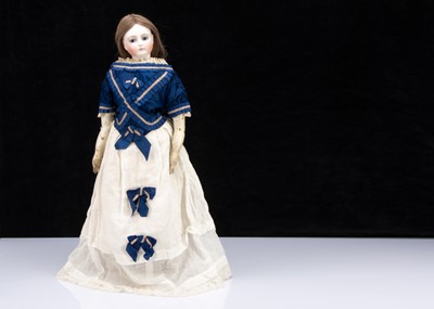 Lot 1354 - A large late 19th century French pressed bisque swivel-head fashionable doll