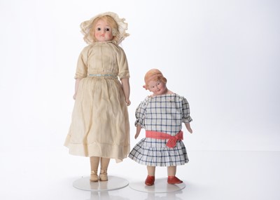 Lot 1364 - Two British bisque headed dolls