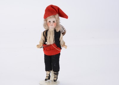 Lot 1369 - A small German bisque headed doll