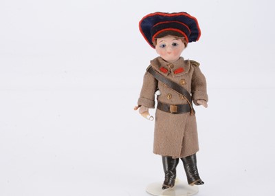 Lot 1370 - A small German bisque headed French soldier doll