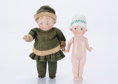 Lot 1379 - A small German googly-eyed all-bisque doll