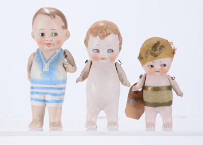 Lot 1380 - Three small German and Japanese all-bisque comic children
