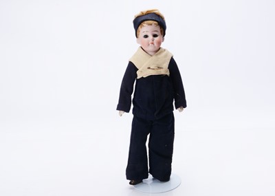 Lot 1392 - An American Schoolboy type bisque shoulder-head boy doll