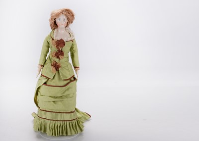 Lot 1420 - A fine solid-domed china shoulder-head doll
