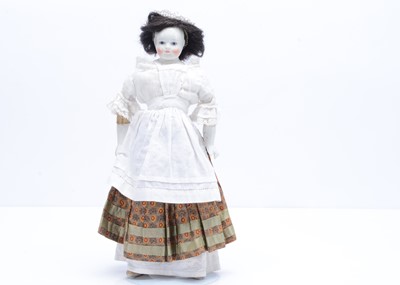 Lot 1434 - A French porcelain shoulder-head fashion doll