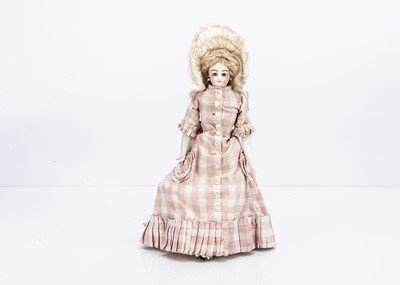 Lot 1437 - A small French shoulder-head fashionable doll