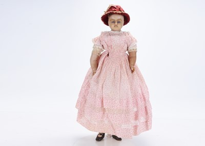 Lot 1441 - A mid 19th century  English poured wax shoulder-head child doll