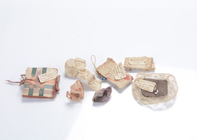 Lot 1458 - A mid 18th century English needlework and pin work basket containing an assortment of doll, sewing and miniature items