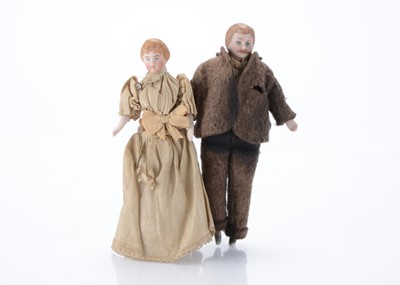 Lot 1467 - A German Edwardian bisque shoulder-head dolls’ house couple