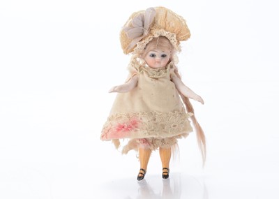Lot 1468 - A German all-bisque dolls’ house doll