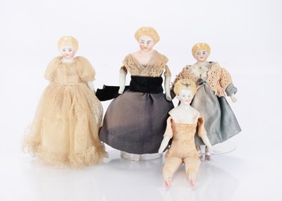 Lot 1477 - Three German bisque shoulder-head dolls’ house dolls