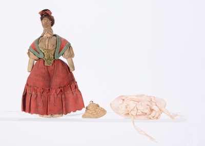 Lot 1490 - A tiny Grodnerthal dolls’ house doll