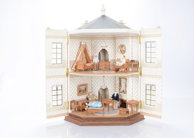 Lot 1491 - A mid 19th century German wooden dolls’ house set