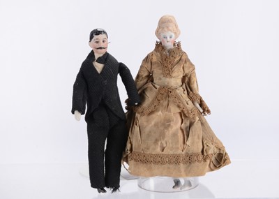Lot 1511 - Two bisque shoulder-head dolls’ house dolls