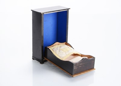 Lot 1526 - A rare mid 19th century Waltershausen dolls’ house bachelor bed/wardrobe