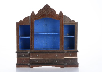 Lot 1538 - A rare mid 19th century Waltershausen dolls’ house breakfront bookcase