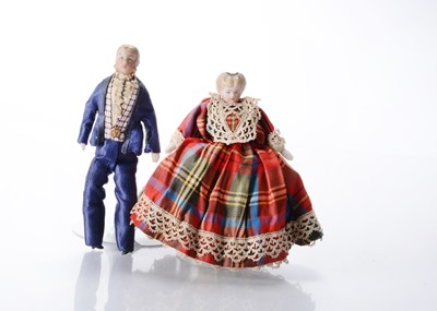 Lot 1539 - A mid 19th century bisque shoulder-head dolls’ house couple