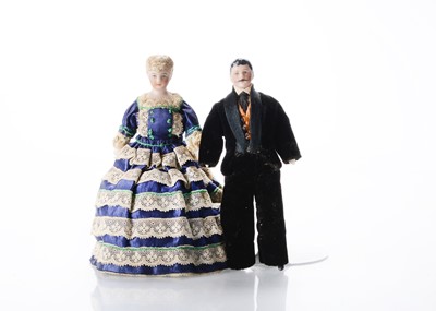 Lot 1540 - A mid 19th century bisque shoulder-head dolls’ house couple