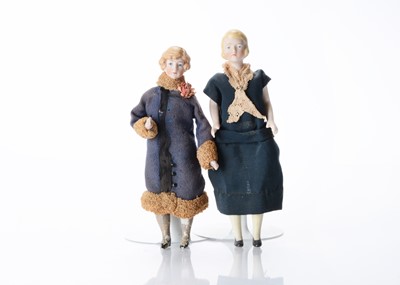 Lot 1554 - Two German bisque shoulder-head dolls’ house women