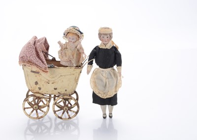 Lot 1558 - A German dolls’ house bisque shoulder-head doll