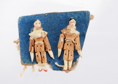 Lot 1582 - Two tiny Grodnerthal carved wooden dolls’ house dolls