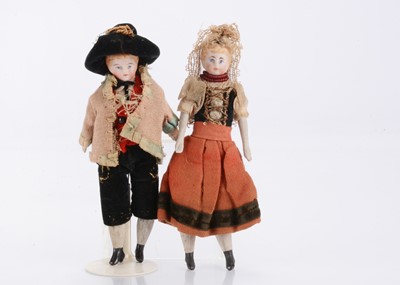 Lot 1587 - A 19th century bisque shoulder-head dolls’ house couple