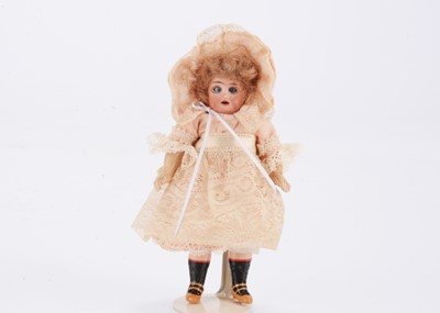 Lot 1593 - A German bisque headed dolls’ house doll