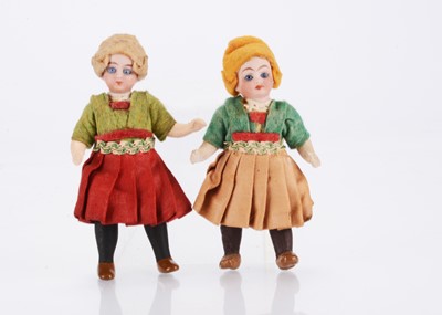 Lot 1595 - Two German bisque headed girl dolls’ house dolls