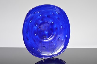 Lot 52 - An Art Deco blue glass charger by Charles Schneider
