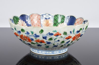 Lot 109 - A Japanese porcelain flower head bowl