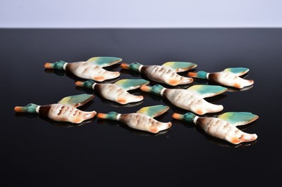 Lot 116 - A set of eight Art Deco pottery flying ducks