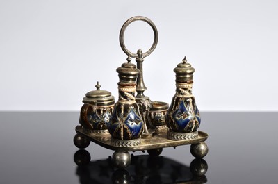 Lot 127 - A Royal Doulton stoneware four piece cruet set on silver plated stand