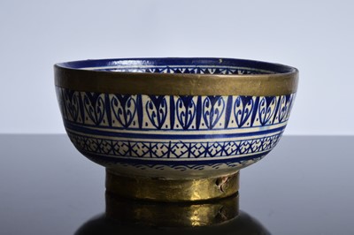 Lot 130 - A North African blue and white pottery bowl