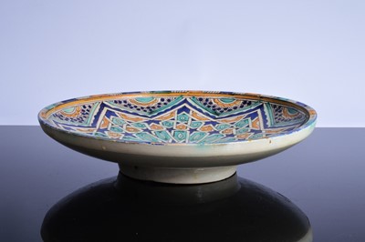 Lot 133 - A large North African pottery dish