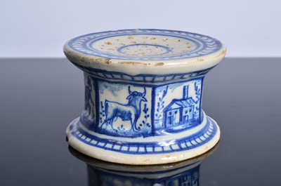Lot 134 - A deflt pottery hat pin stand
