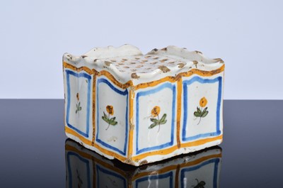 Lot 187 - A small late 18th or early 19th century French Faience pottery flower brick