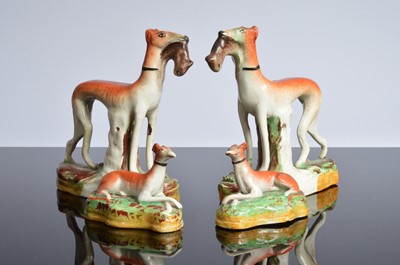 Lot 199 - Two Victorian Staffordshire pottery models of greyhounds