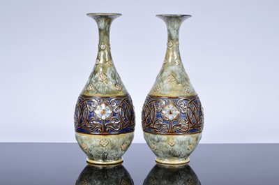 Lot 221 - A pair of late Victorian Royal Doulton stoneware vases