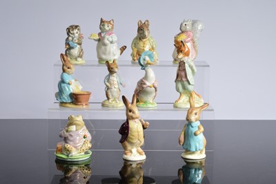 Lot 233 - Eleven Beswick Gold Stamped Beatrix Potter figures