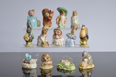 Lot 235 - Thirteen Beswick brown stamped Beatrix potter figures