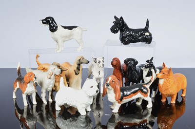 Lot 253 - A collection of thirteen Beswick dogs