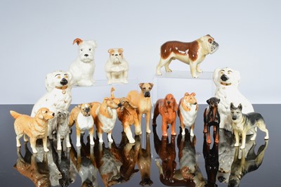 Lot 254 - A collection of fifteen Beswick dogs